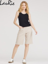 LauRie Donna, ljus sand shorts.     KO-TEX