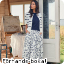 En otroligt vacker design p� denna marinvita kjol